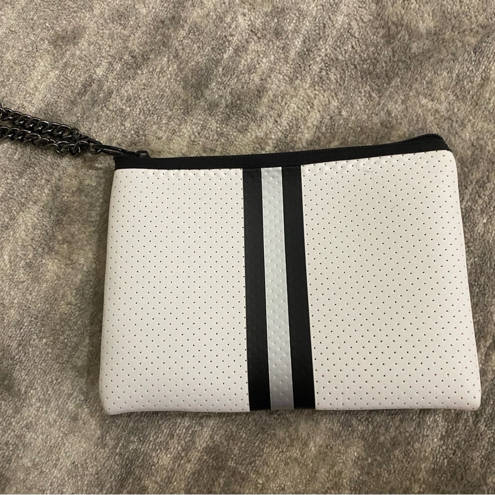 Haute Shore clutch with detachable wristlet.